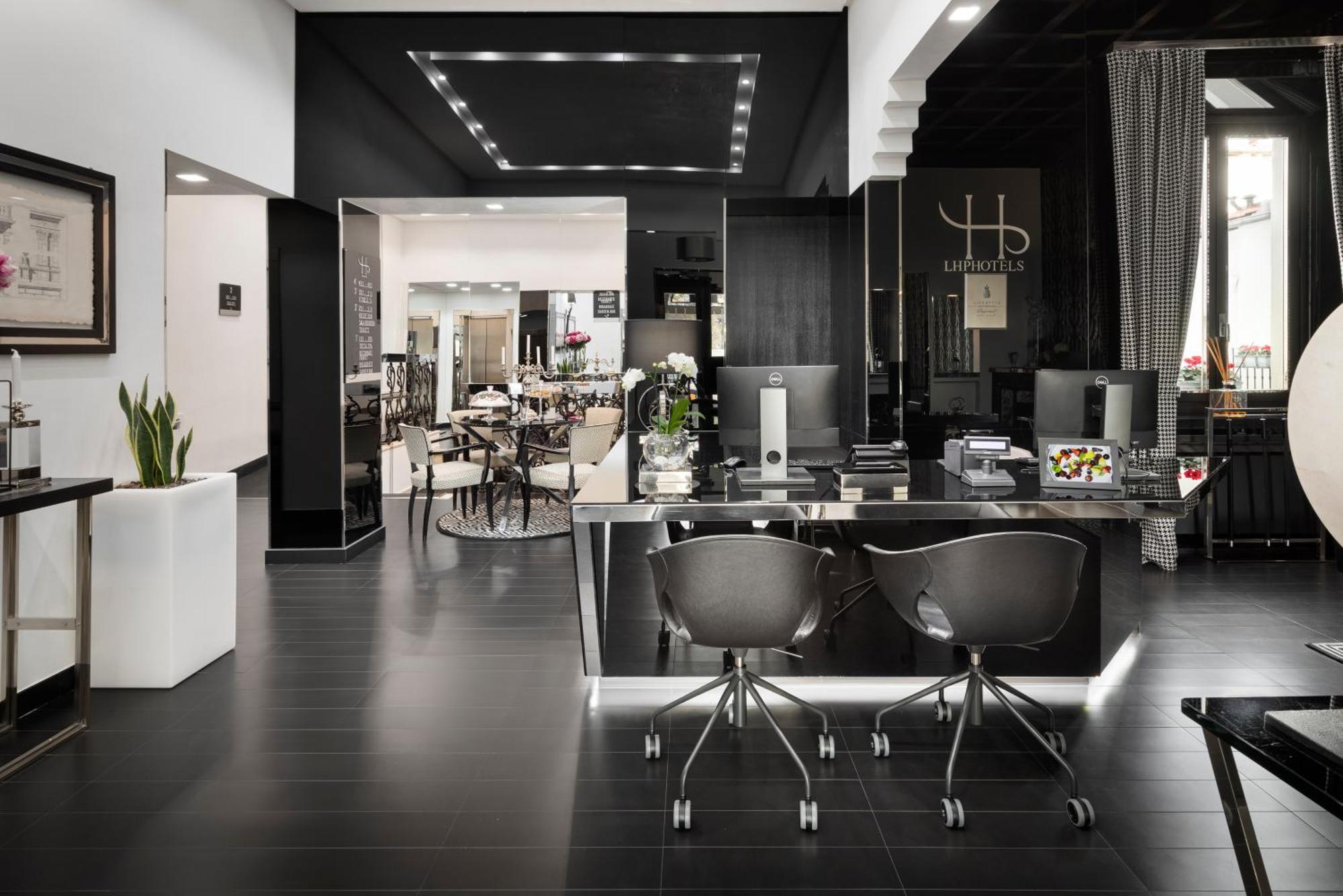 Lhp Hotel River & Spa Firenze Esterno foto The interior of the office of the company
