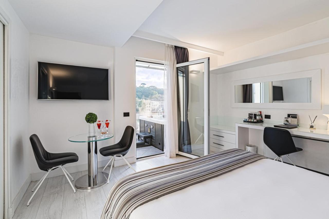 Lhp Hotel River & Spa Firenze Esterno foto A typical room at the hotel